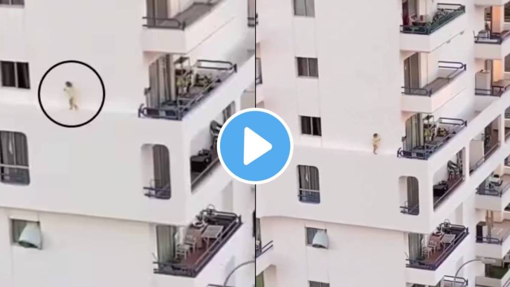 kid walks on edge of a building kid walks on edge of a building