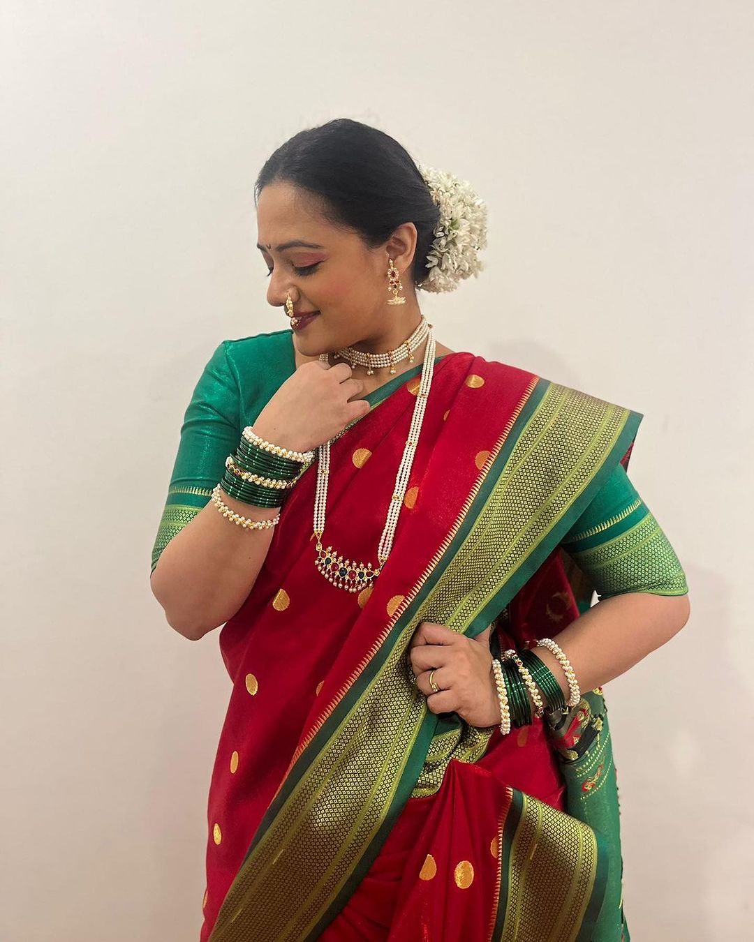 Spruha Joshi Red Nauvari Saree Look