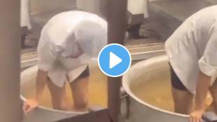 workers mashing potatoes with feet at OP Jindal University