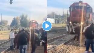 People standing on the side of the track and taking selfies Then suddenly a train comes there