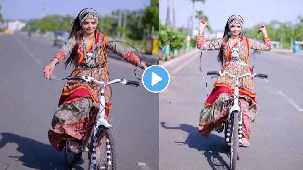 Girl jumping rope while riding a bicycle without holding handle