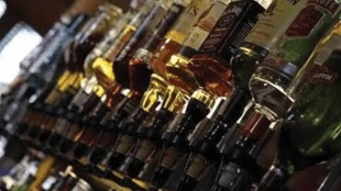 liquor stock bag seized coach Sevagram station Himsagar Express wardha