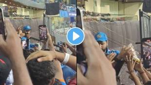 India captain Rohit Sharma gives away his boots to a fan at the Wankhede Stadium