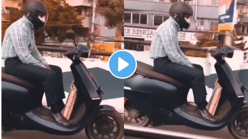 Persons driving a scooter dangerous stunt on highwa video viral