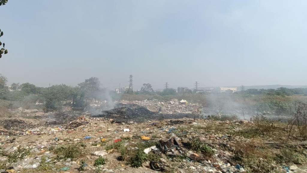 Garbage burning next to Ambernath station Garbage burning next to Ambernath station
