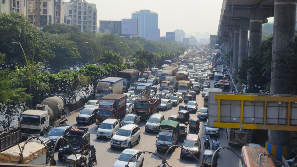 path blocked by containers traffic jam on main road thane