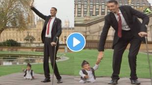 showing worlds tallest man standing with sorlds shortest man in london gwr old video goes viral