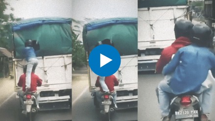 Thieves stole from a moving truck that too on a bike The incident was caught on camera the video is going viral
