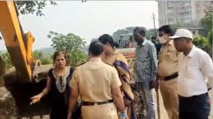 woman opposed concretization work, concretization work of shilphata to umbarli road