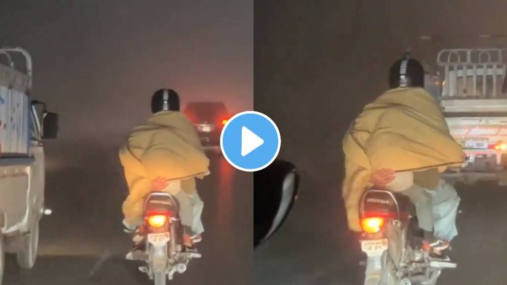 man driving bike and hold boy with one hand father and childress bonging video viral best papa man driving bike and hold boy with one hand father and childress bonging video viral best papa
