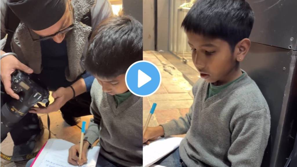 little boy studying on footpath Photographer Shared A heartwarming video of champ Who works to support family little boy studying on footpath Photographer Shared A heartwarming video of champ Who works to support family