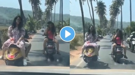 While Riding Famous Coconut Tree Road In Goa Two Girls Sit Opposite On Two Wheeler bike To Record Reels