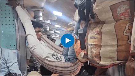 Passenger sleeps in makeshift hammock in overcrowded Brahmaputra Mail Railway Pics video