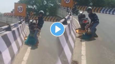 Viral video: Man assaults wife on Chennai flyover Viral video: Man assaults wife on Chennai flyover