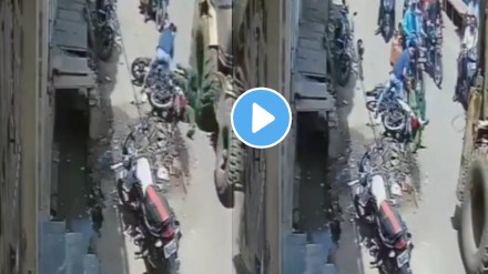 Meerut jcb accident couple bike hit by jcb machine women save by narrow escape video Meerut jcb accident couple bike hit by jcb machine women save by narrow escape video