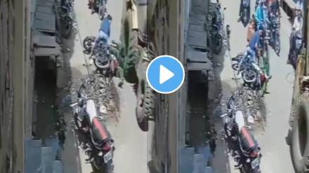 Meerut jcb accident couple bike hit by jcb machine women save by narrow escape video