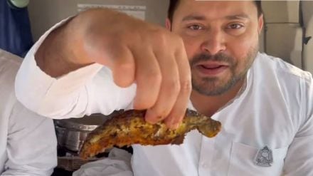 Tejashwi Prasad Yadav eating fish