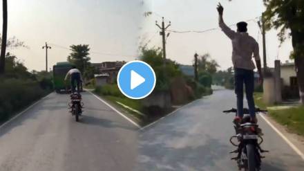 Stunt on bike a man stood on a moving bike and started overtaking