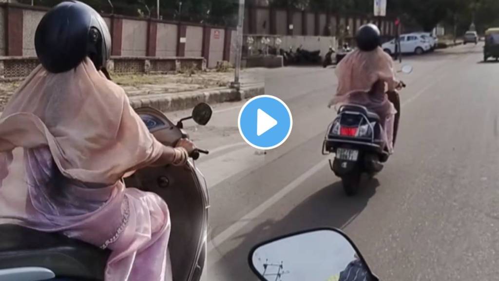 Viral Video clip features a woman riding a scooter in the most unconventional way imaginable take one look Viral Video clip features a woman riding a scooter in the most unconventional way imaginable take one look