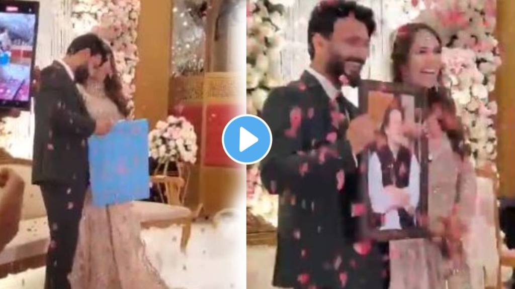 Pakistani groom gives his bride a photo of former Prime Minister Pakistani groom gives his bride a photo of former Prime Minister