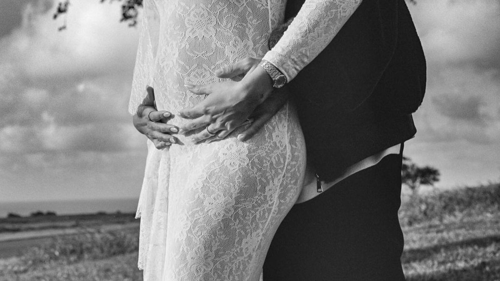 In this black and white picture, Justin is cradling the baby bump.