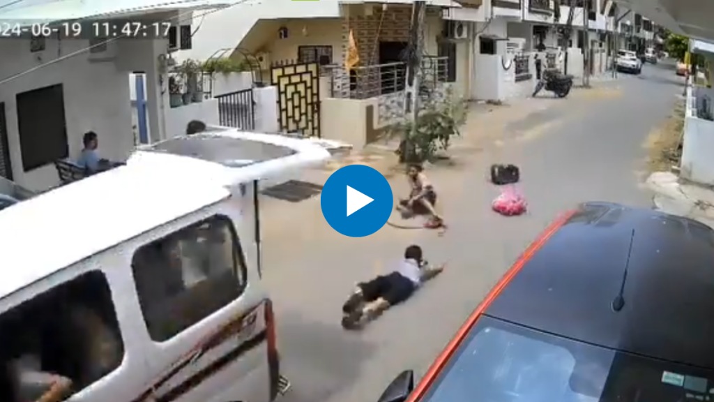 A shocking video of two schoolgirls falling out of a moving school van has surfaced online