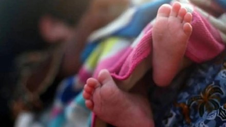 young woman threw baby in garbage heap