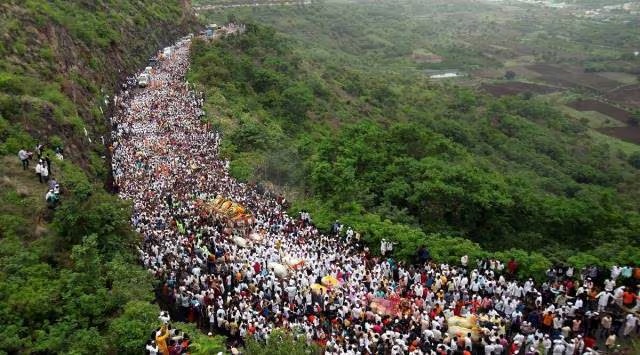 File photo of lakhs of Warkaris crossing the Dive ghat near Saswad along with Sant Dnyaneshwer Palkhi during the month-long annual Pandharpur pilgrimage. (Express photo by Arul Horizon)