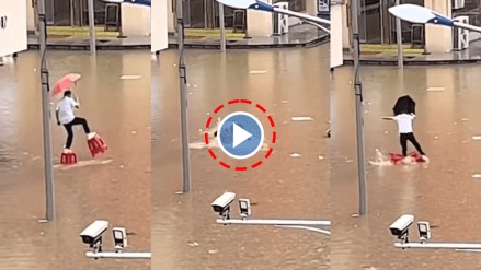 Viral Video of man tied table to legs in waterlogged road in rainy season