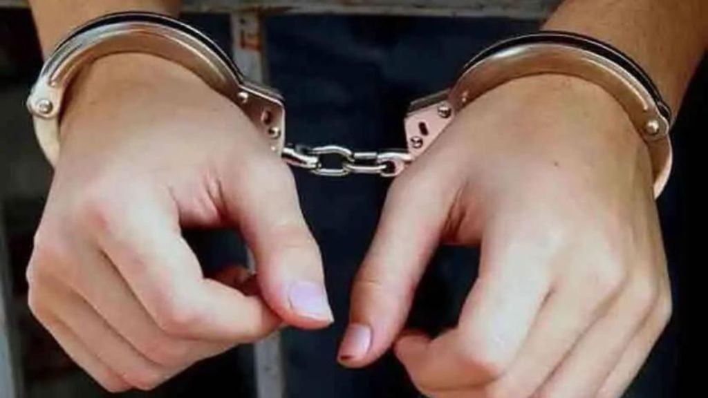 Motorist arrested for kicking traffic police
