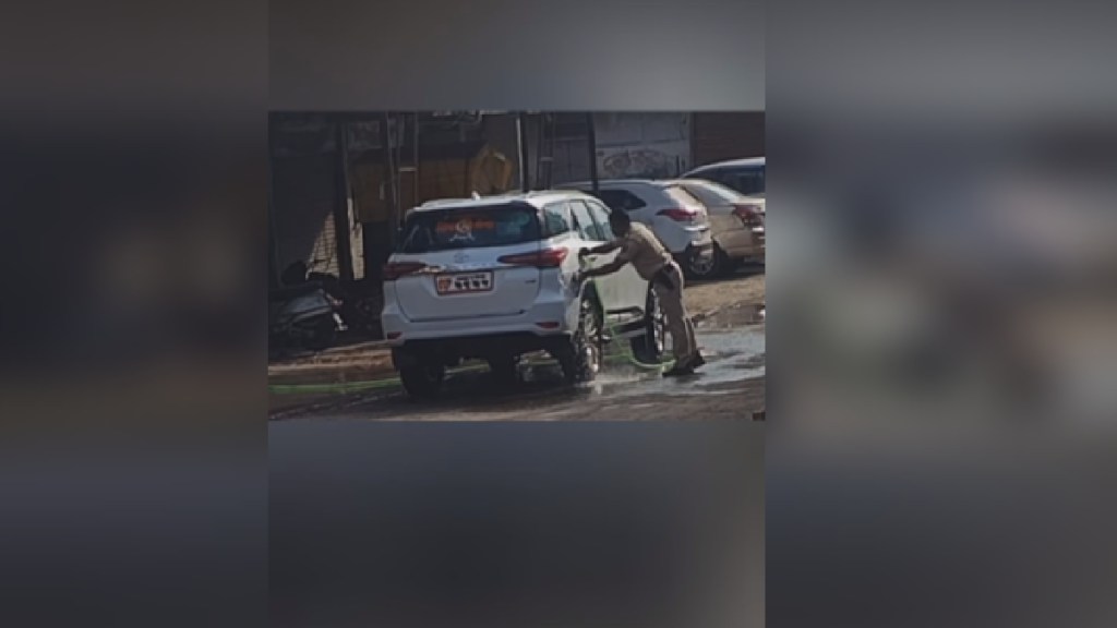 Shinde group MLA Sanjay Gaikwad cleaning car from the security guard video viral buldhana