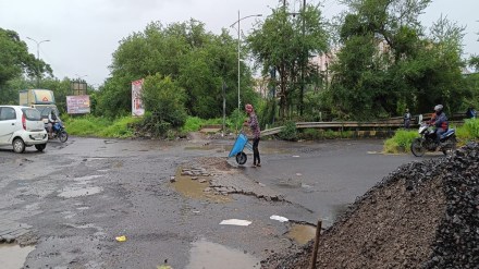 Repair of potholes, Uran-Panvel road,