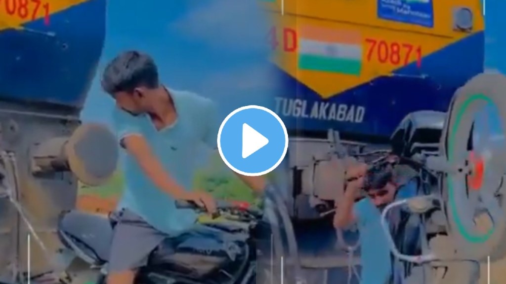 Viral VIDEO: Youth Attempts To Pull Train Engine With Bike For Social Media Reels In UP's Viral VIDEO: Youth Attempts To Pull Train Engine With Bike For Social Media Reels In UP's