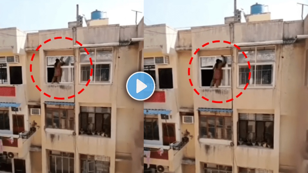 Viral video of woman cleaning window diwali safai from top floor of building Viral video of woman cleaning window diwali safai from top floor of building