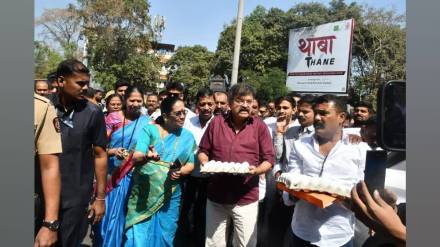 NCP leader mla jitendra awad protested with eggs in thane collector ashok shingares hall