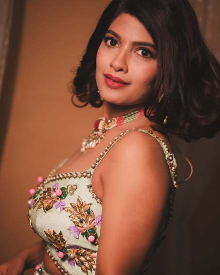 Dhanashri Kadgaonkar Red Banarasi Saree Look