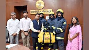 district collector vinay gowda g c distributed fire proximity suits to fire brigade personnel