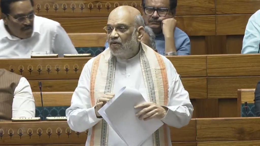 A Sahkar Taxi car on the road, part of the government initiative to support taxi drivers and challenge Uber and Ola.