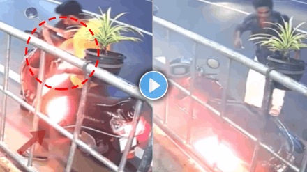 Shocking video of father and son accident scooter caught fire in Kerala video viral
