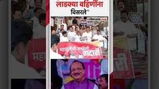 Opposition members chant slogans and protest on the steps of the Vidhan Bhavan