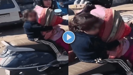 Shocking video of mother careless behaviours towards her daughter on scooter terrifying video viral Shocking video of mother careless behaviours towards her daughter on scooter terrifying video viral