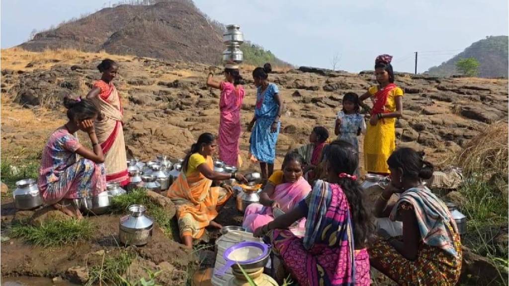 villagers struggle for water by digging hole in dry river water problem in raigad district