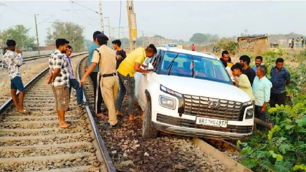 'Drunk' Man Drives Onto Railway Tracks Following Google Maps In UP, Narrowly Escapes Major Accident photos viral 'Drunk' Man Drives Onto Railway Tracks Following Google Maps In UP, Narrowly Escapes Major Accident photos viral
