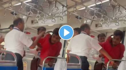 Virar local shocking video TC beats up young man in Virar AC local train for not having ticket video goes viral