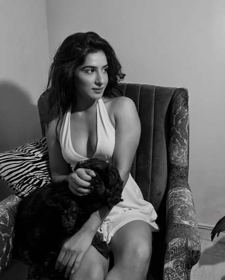neha khan bold in sleeveless white dress