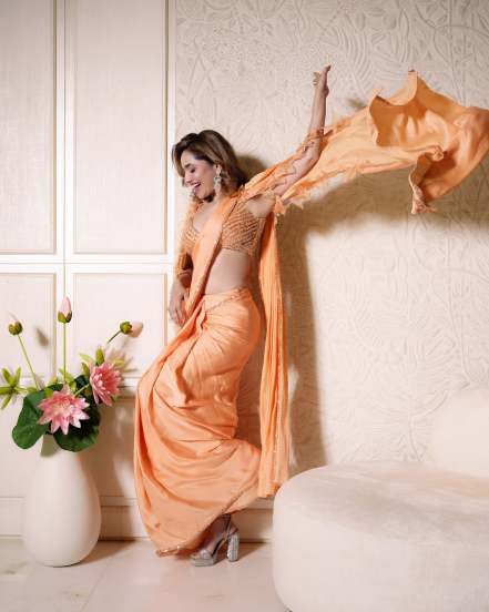 Ankita lokhande hot in orange saree