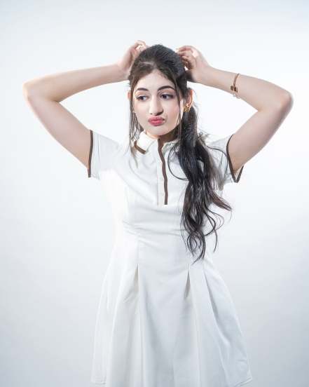 Bajrangi Bhaijaan fame Harshaali Malhotra stuns fans with her latest photos in a white dress See how Munni looks now elegant and grown up