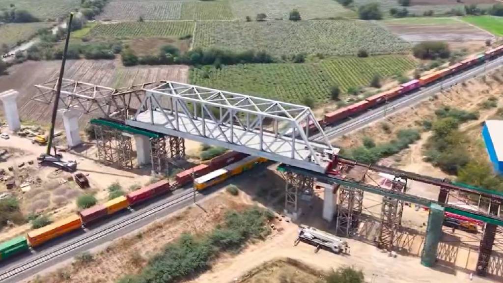 Bullet train project 70 meter Steel bridge launched over freight corridor in Vadodara Dedicated freight corridor