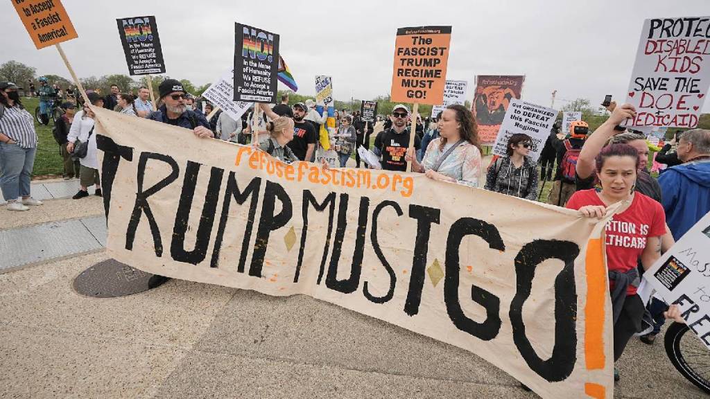 Strong protests US citizens on streets against policies of us president donald Trump elon Musk