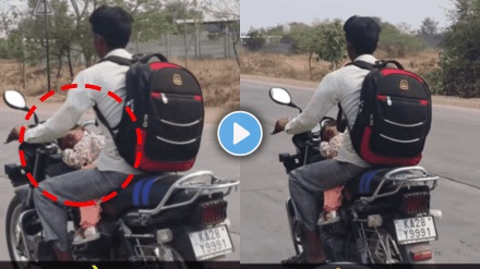 Emotional video of father riding a bike with kid sleeping on it viral video on social media